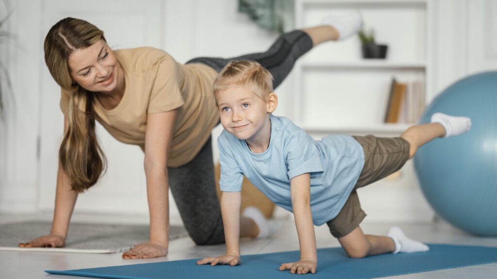 Therapist and Child Extended Leg Exercise Click to go to our Physical Therapy Treatment page