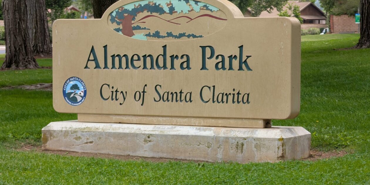 Sign identifying Almendra Park located within the City of Santa Clarita.