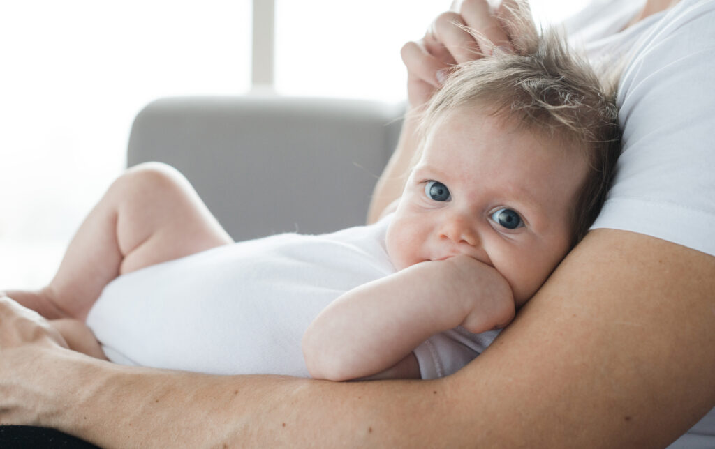 cute-baby-father-arms-home
